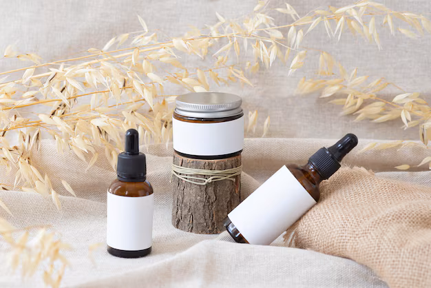 A facial care jar sits on a tree stump, highlighting the beauty of the photo.